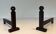 Pair of Minimalist Modernist Wrought Iron Chenets with Torch Holders in Nut Design