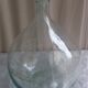 Demijohn in white glass