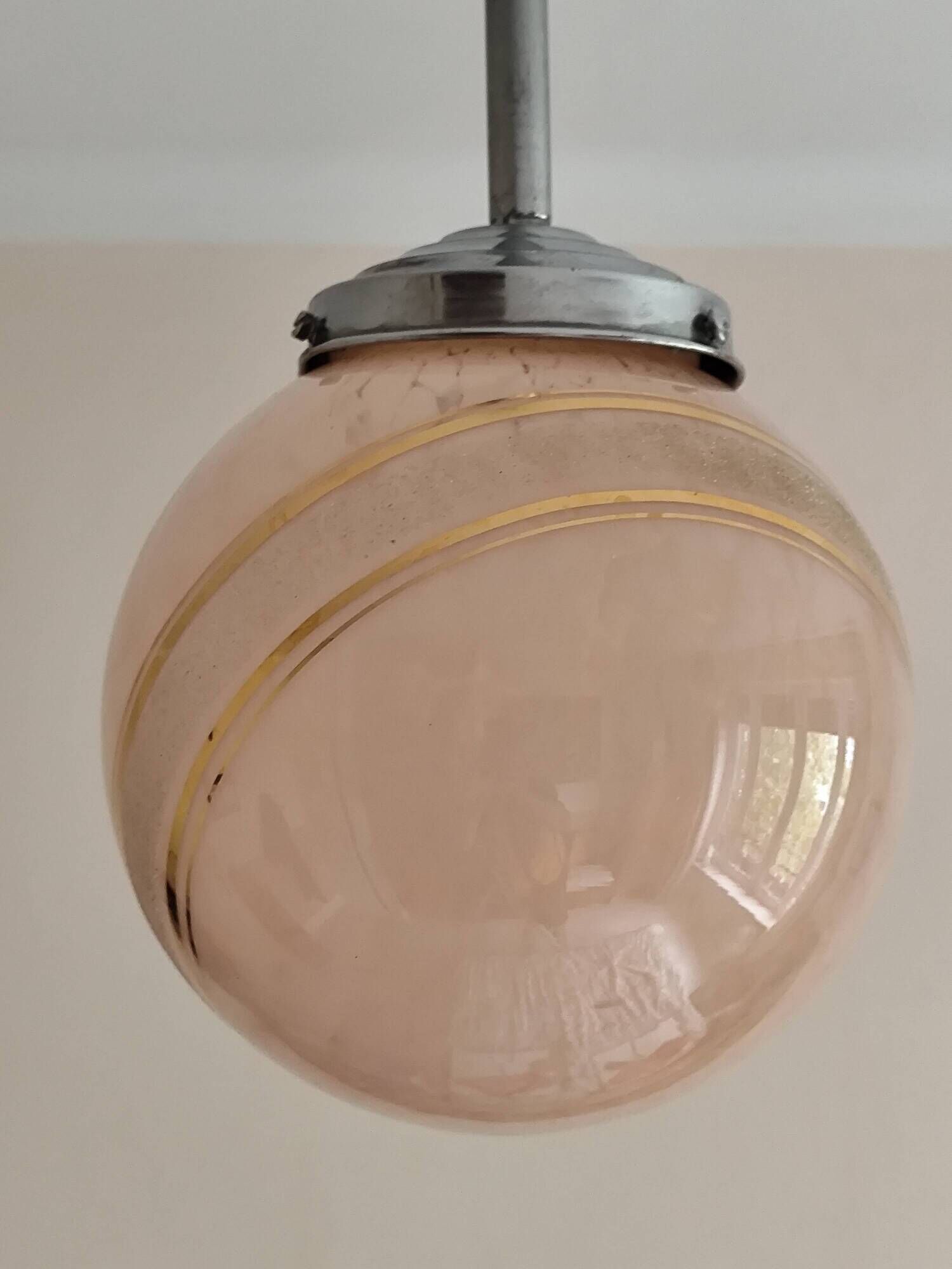 suspension glass globe pink and gold on a metal aluminium stem and structure