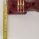 Pair of art deco sconces in bordeaux and gold ceramics