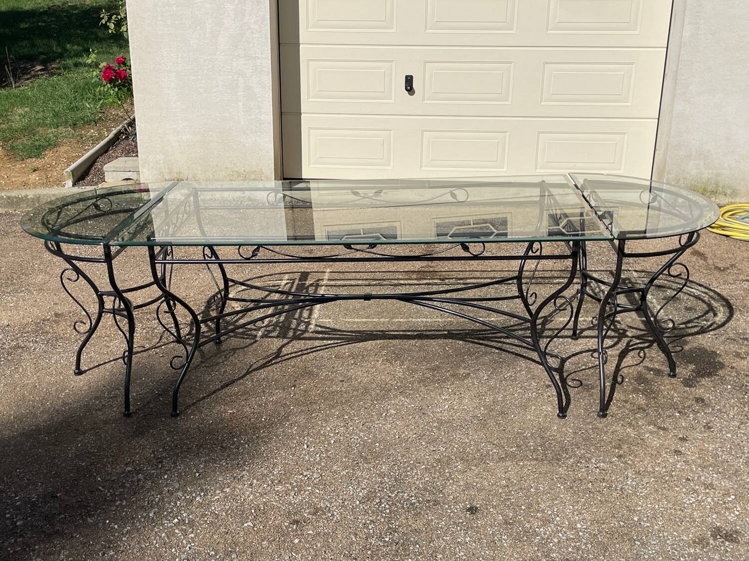 Glass and iron table with two side tables and 8 chairs