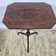 Antique octagonal mahogany side table on a classic tripod, 19th century.