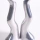 Pair of cast aluminum candle holders by Anna Efverlund