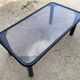 Black tubular coffee table with smoked glass by Yves Boutboul, 1980.