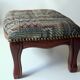 Small foot stool made of wood with upholstery, vintage from the 70s