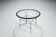 Post-Modern round glass and steel coffeetable attributed to Niels Bendtsen