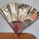 Large Art Deco fan with cranes and cupids in a cage