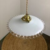 Opaline suspension with two-sided
