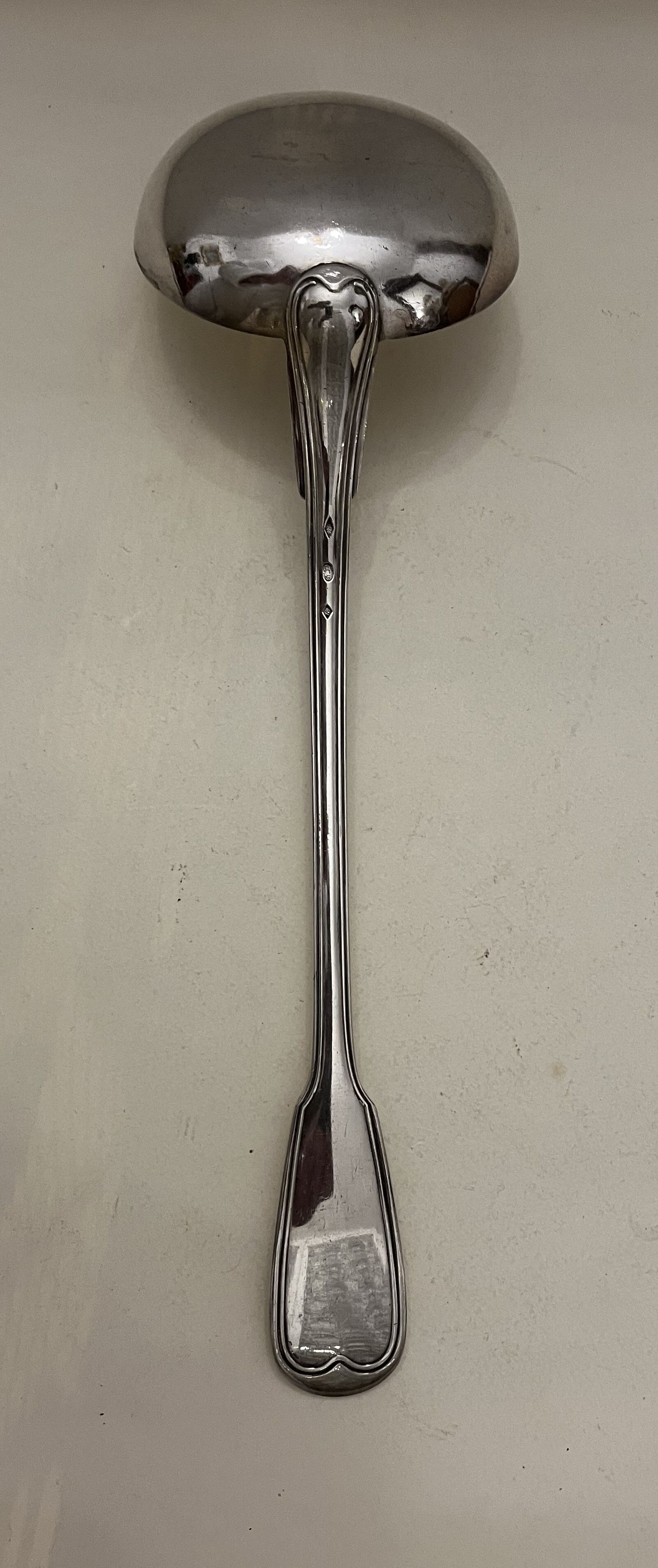 Silver metal ladle