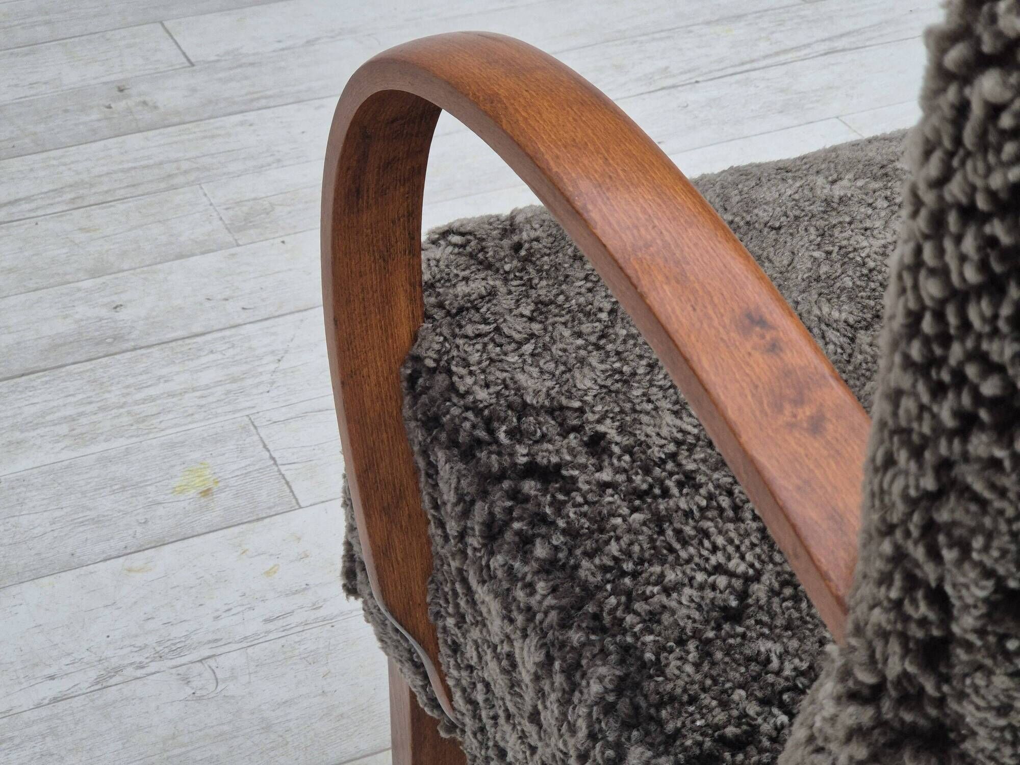 1960s, completely reupholstered Danish art deco armchair, genuine sheepskin "Wellington".