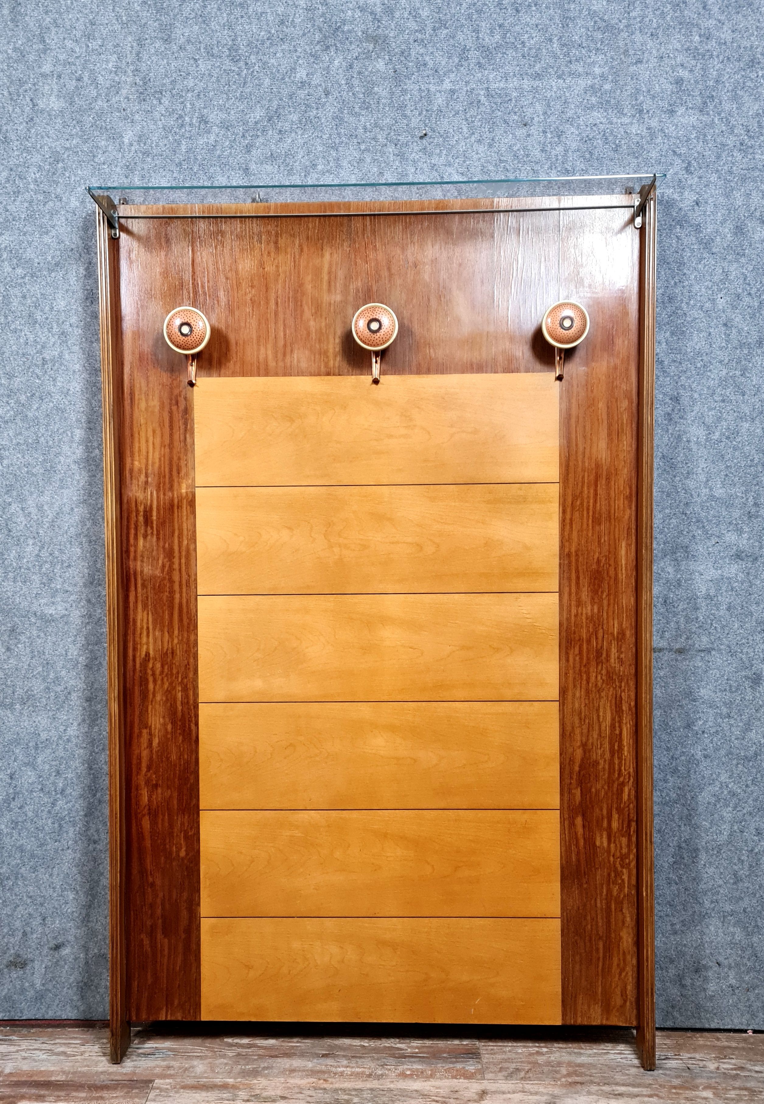 Art deco period coat rack in mahogany and light wood around 1940