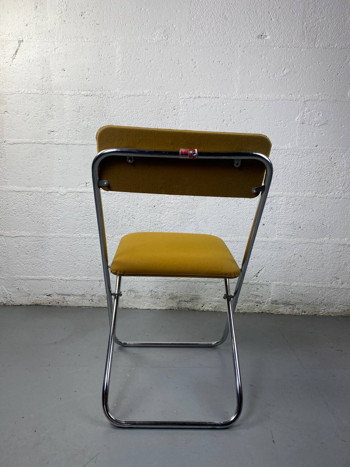 Mustard yellow folding chair
