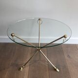 Round coffee table of neoclassical style in brass