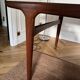Dining table with extension by Johannes Andersen for Uldum Møbelfabrik