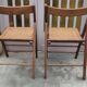 Pair of vintage wooden and cane folding chairs