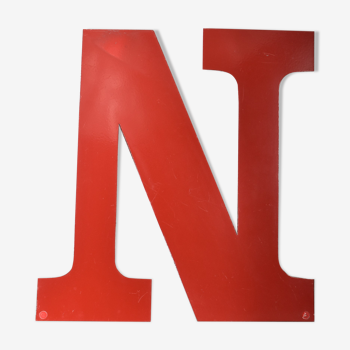 Industrial letter "N" in red metal