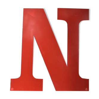 Industrial letter "N" in red metal