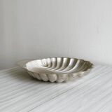 large silver-plated metal shell-shaped dish