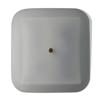 Perforated metal and perspex metal sconce from the 1950s