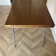 Vintage extendable kitchen table with wood effect Formica and chrome legs.