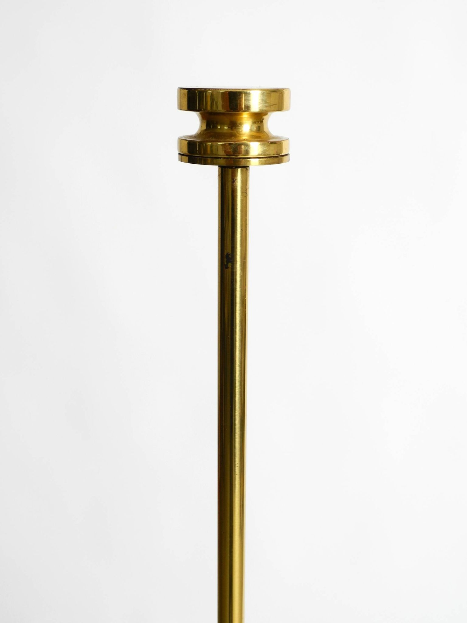 1960s brass table lamp by Vereinigte Werkstätten with an illuminated base