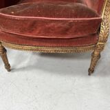Two Louis XVI style wing chairs in gilded wood, 20th century