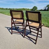Set of 2 folding chairs in wood and cane.