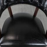 Adjustable black timeless Chesterfield office chair made of cow leather