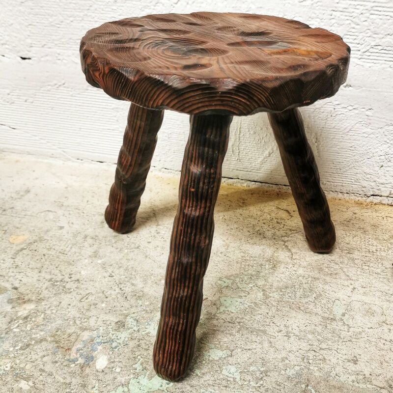 Carved wooden tripod stool