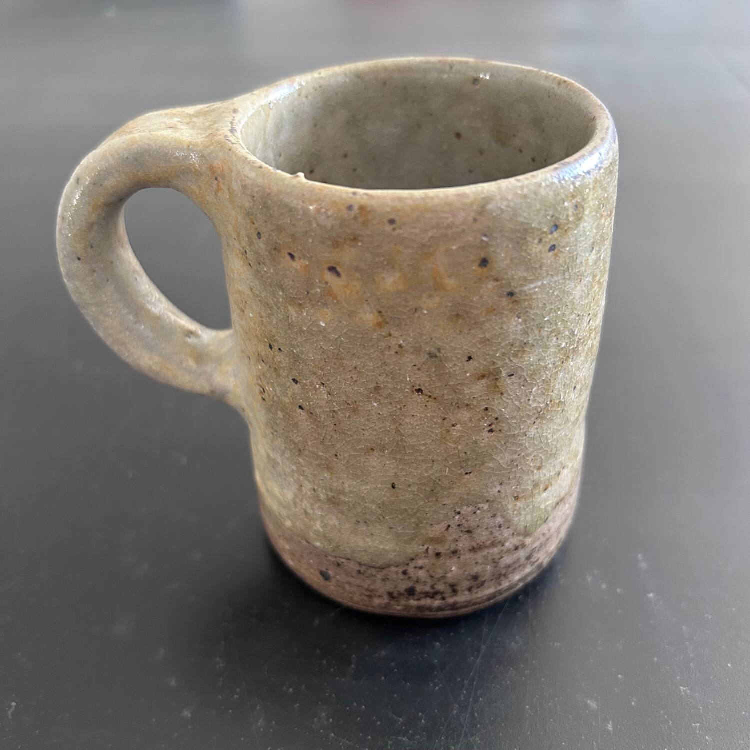 Pair of signed stoneware mugs