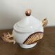 Pot couvert zoomorphe à décor d’hippocampes