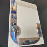 Mirror with ceramic inclusion