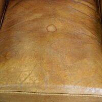 Set of English style light cognac colored leather armchairs.