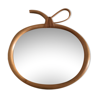 Wicker mirror in the shape of an apple