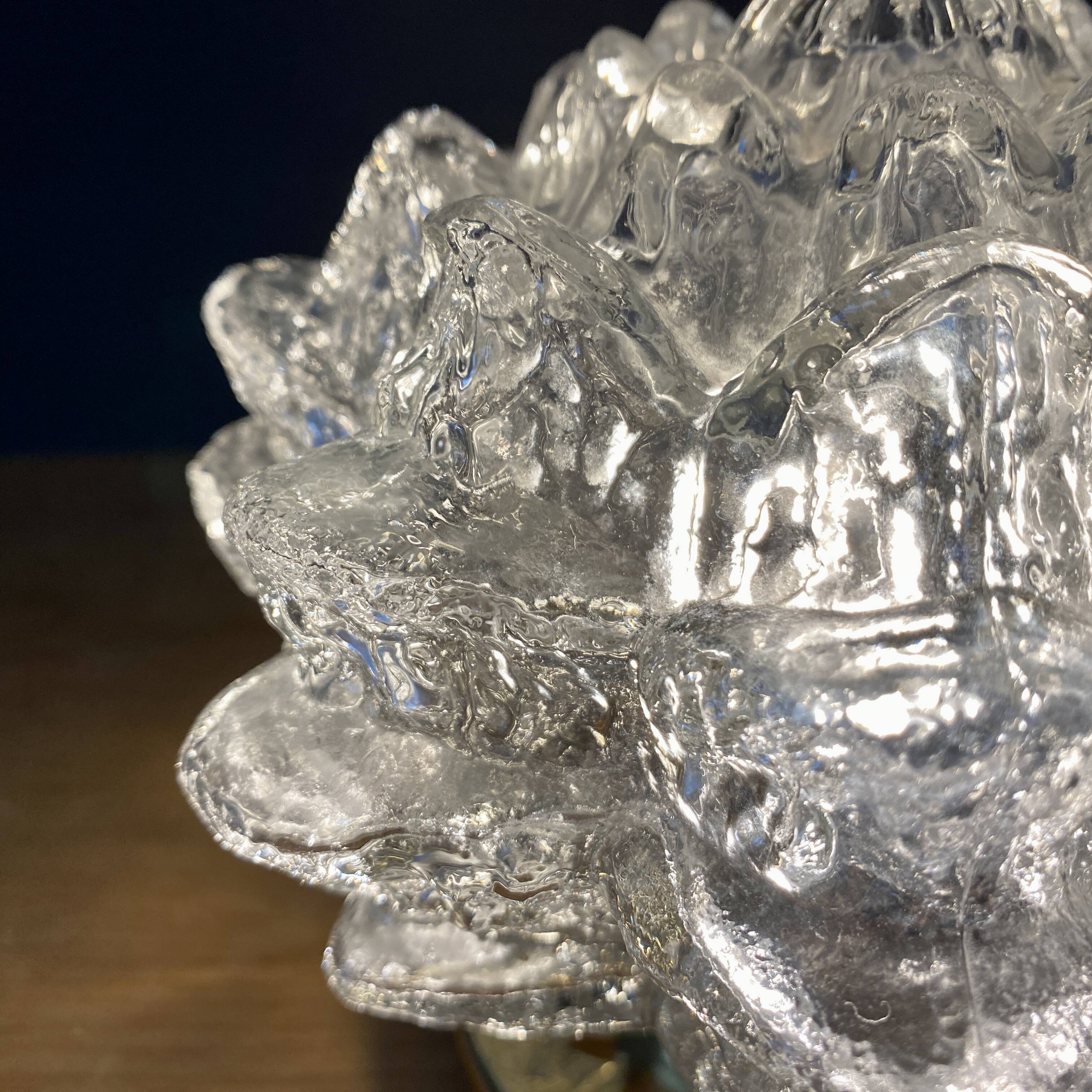 Vintage globe wall or ceiling light in molded glass in the shape of a flower
