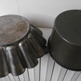Antique metal cake molds