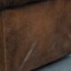 Brown cowhide leather chesterfield armchair  in English style on wheels