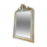 Miroir patiné beige et doré avec un ange