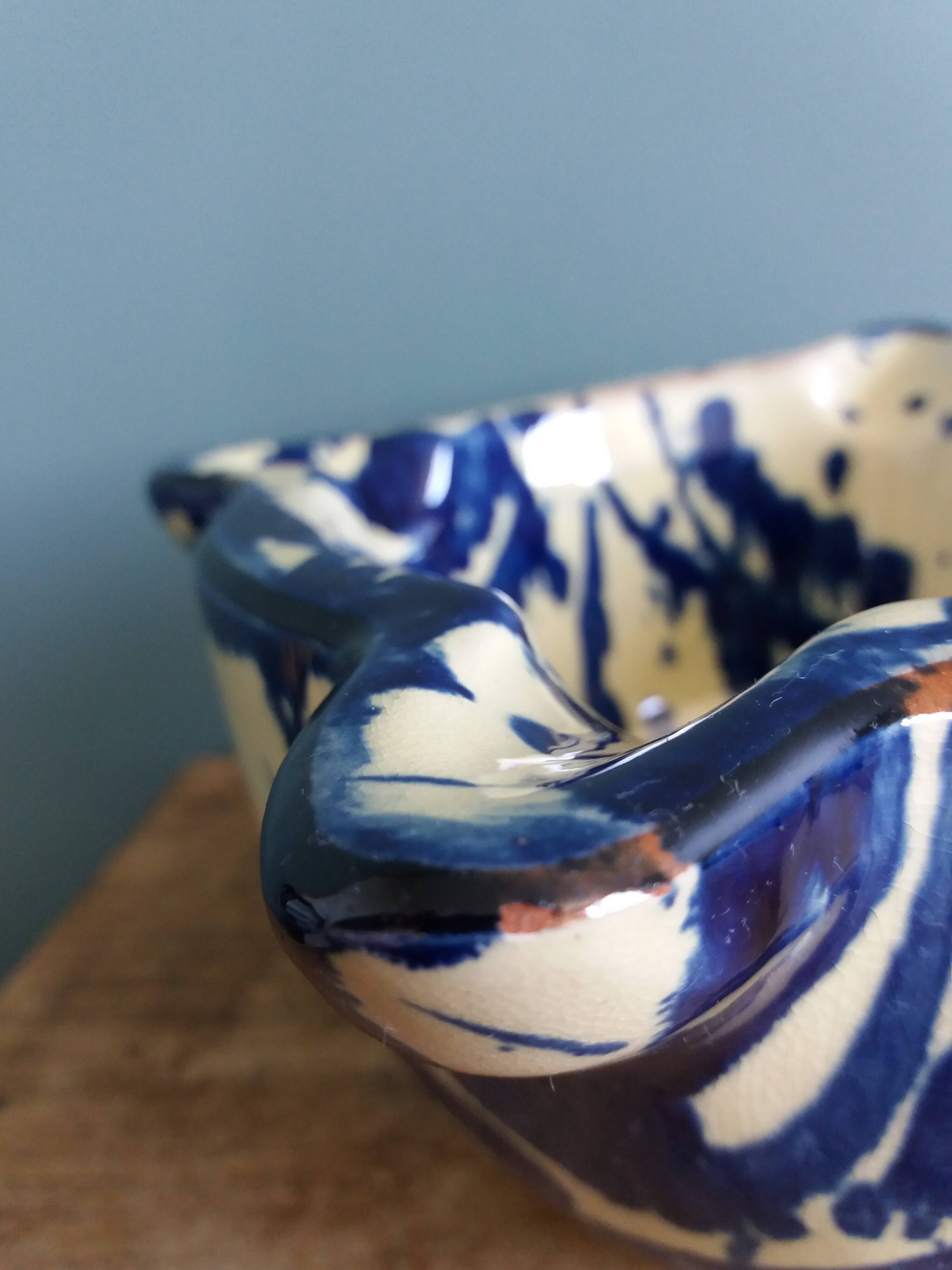 Glazed terracotta mortar and wooden pestle