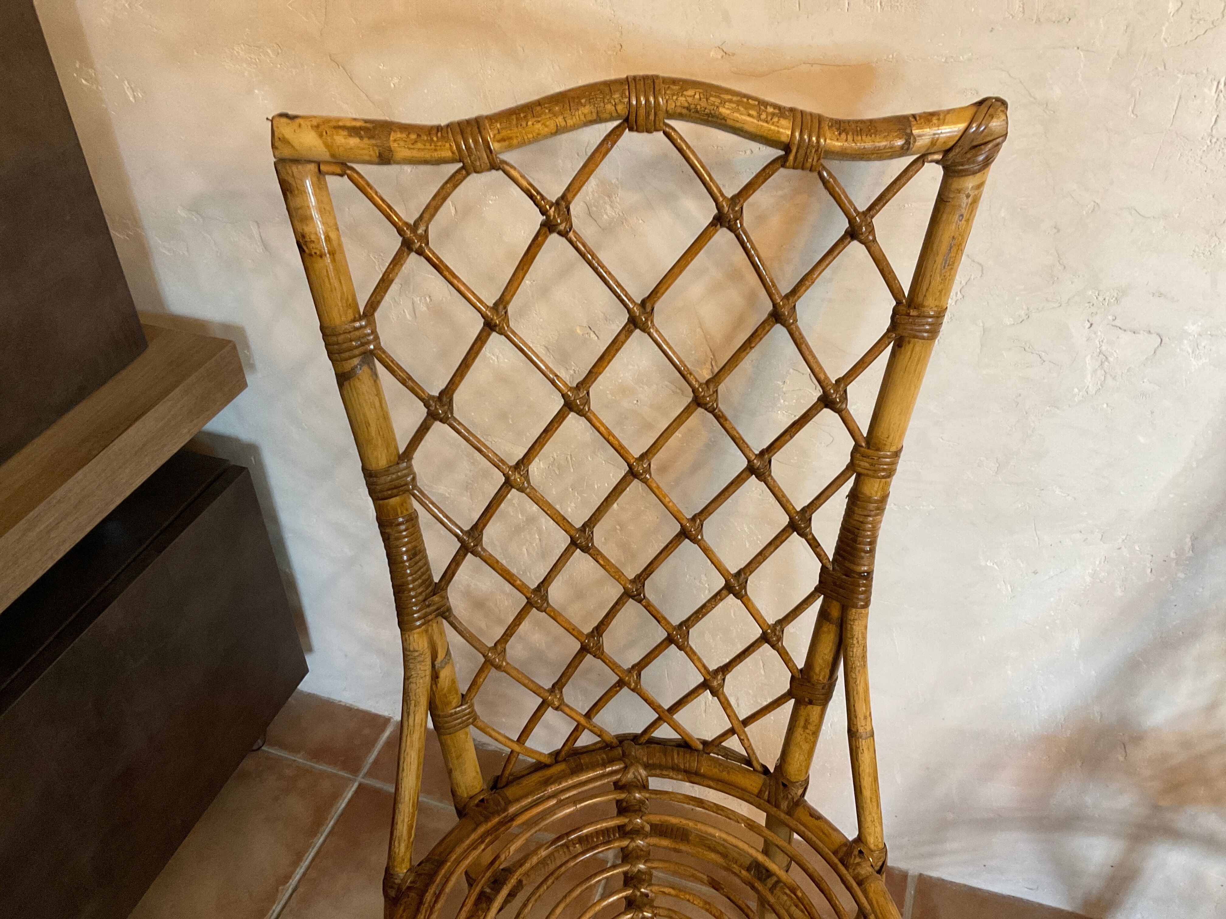 Pair of vintage rattan chairs Louis Sognot