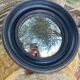 Convex mirror, also known as a witch's mirror.