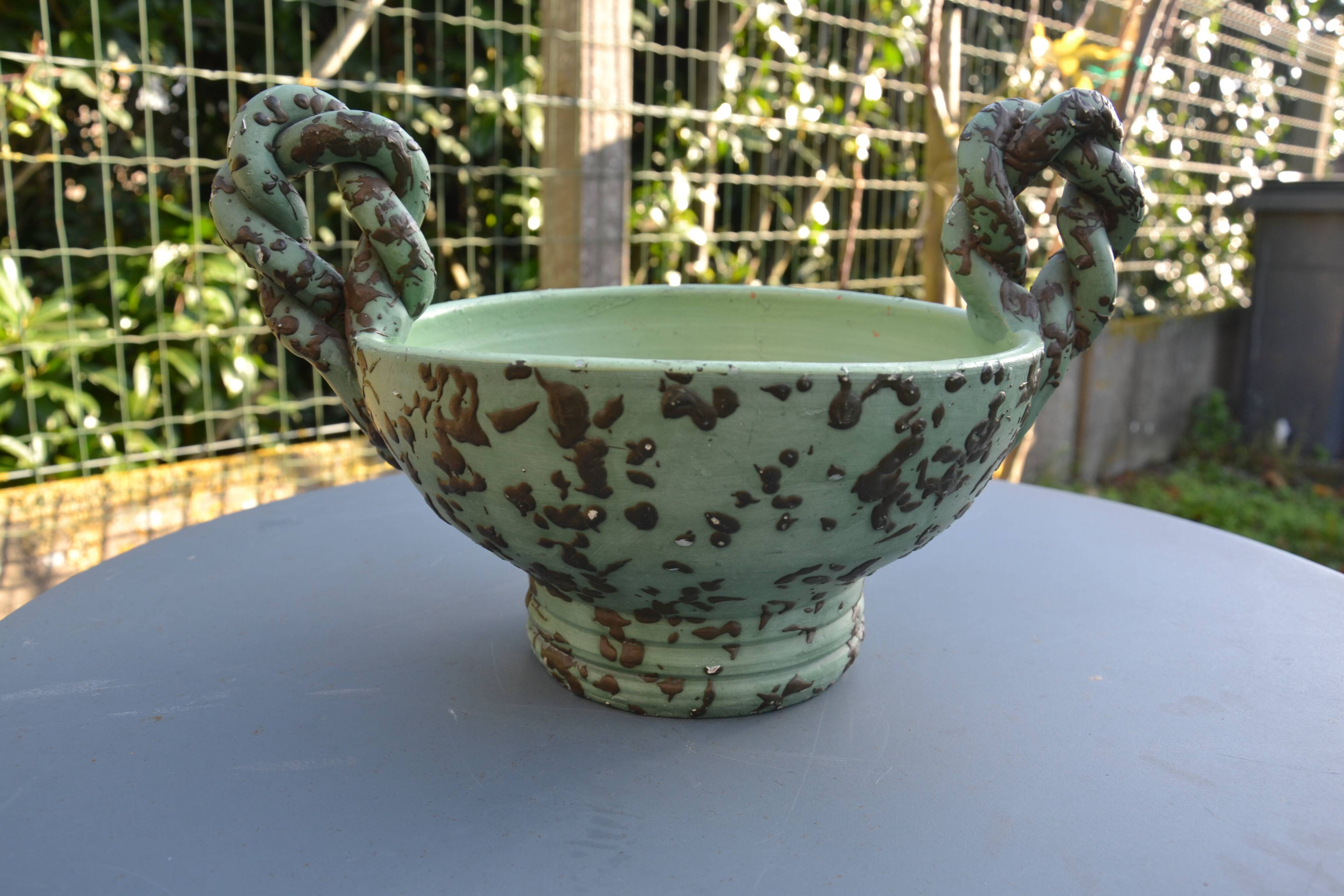 Antique cup with handles