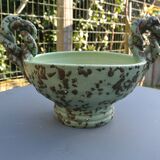 Antique cup with handles