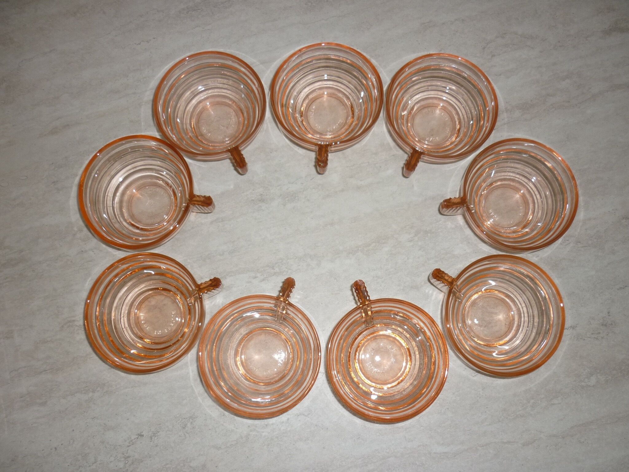 Lot 9 art deco cups in pink transparent glass