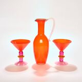 Tall pitcher in bright orange
