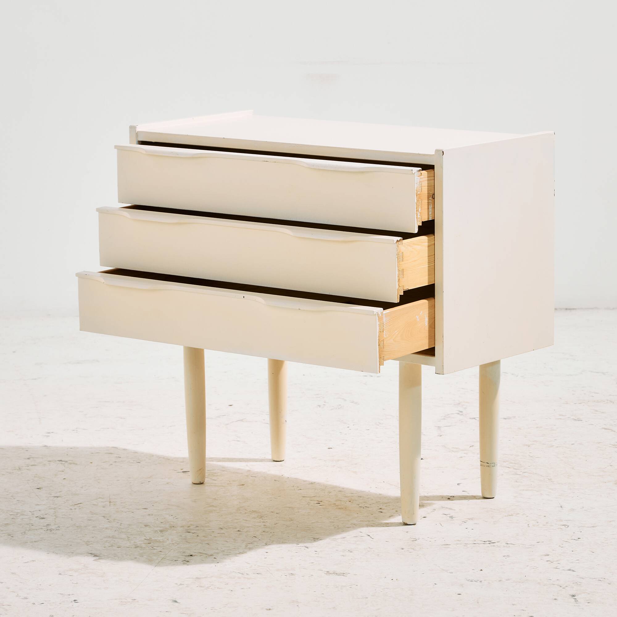White painted nightstand with three drawers