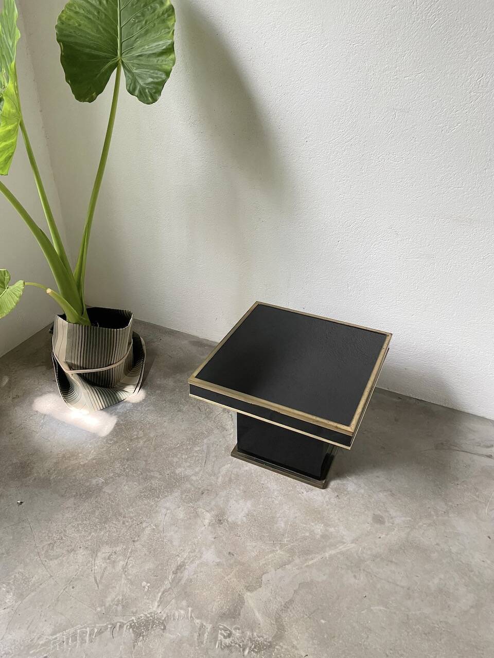 Black lacquer and brass console coffee table
