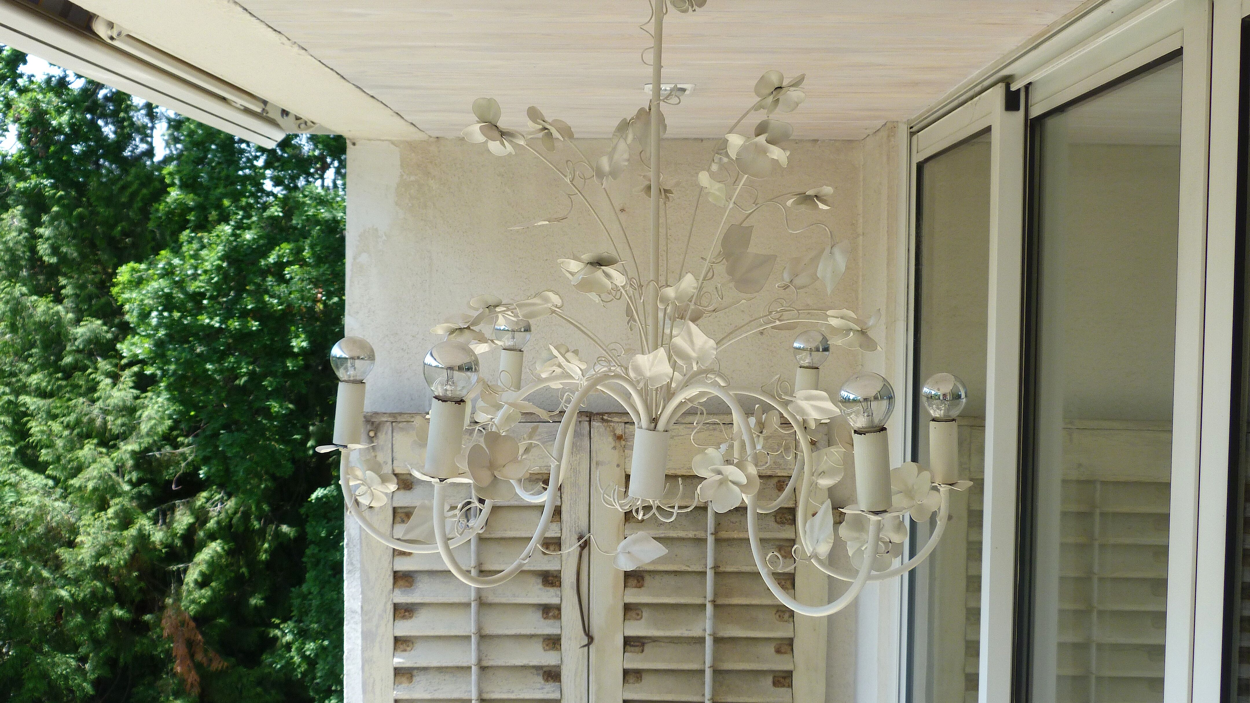 Vintage chandelier in painted metal decoration foliage and flowers