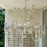 Vintage chandelier in painted metal decoration foliage and flowers
