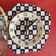 Vintage silent asymmetrical wall pendulum clock "Black and white checkered flowers"